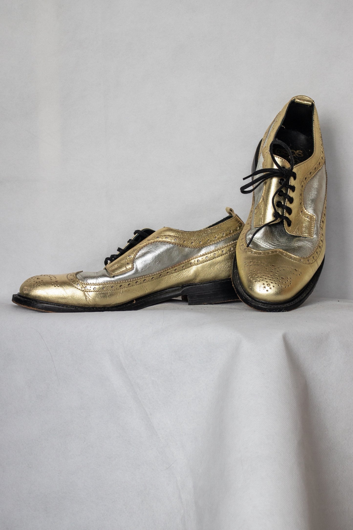 Gold and silver brogues