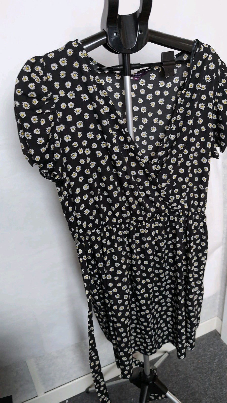 Black dress with daisy print