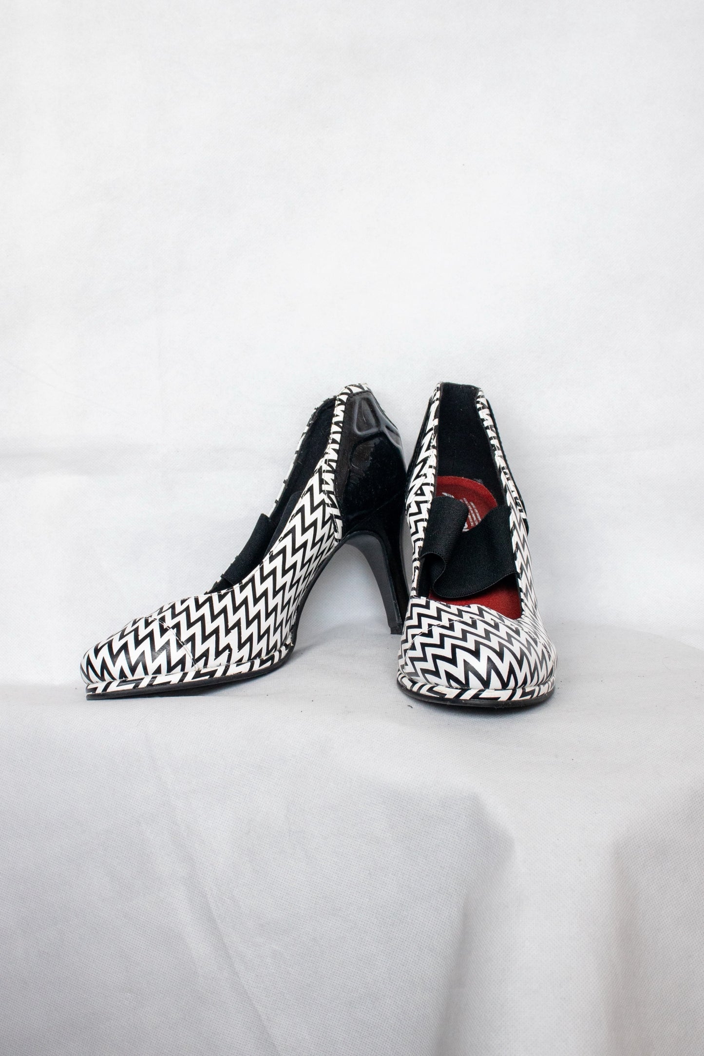 Black and white Adidas heels