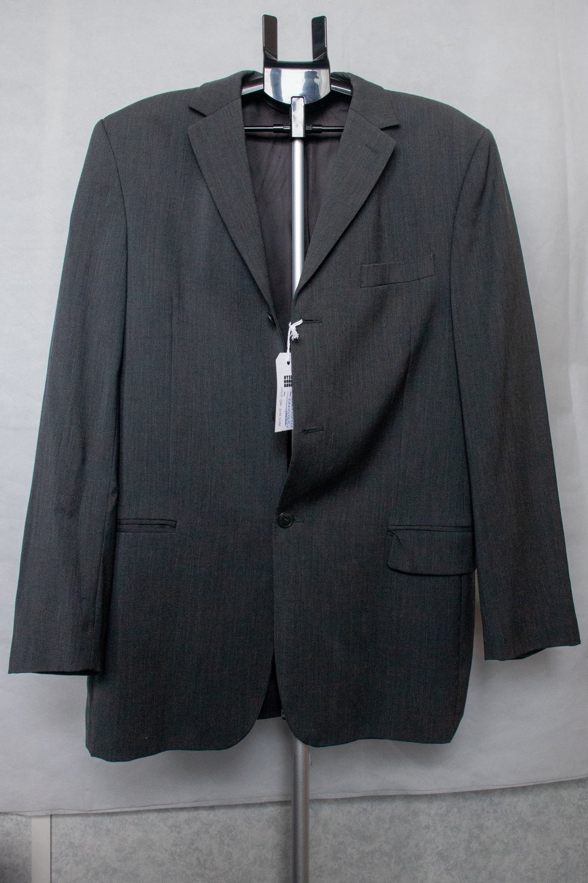 Dark grey single breasted suit
