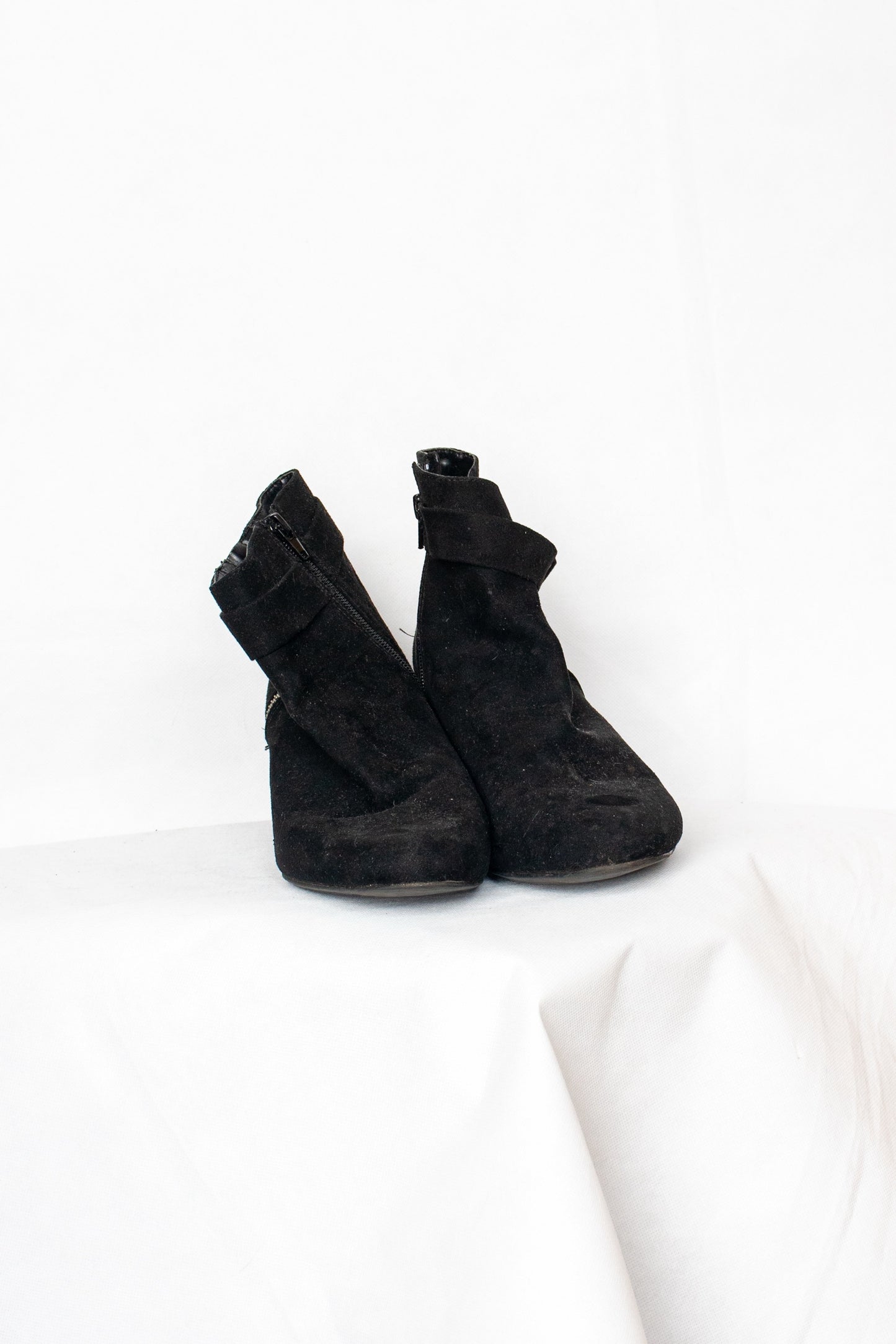 Black buckled boots
