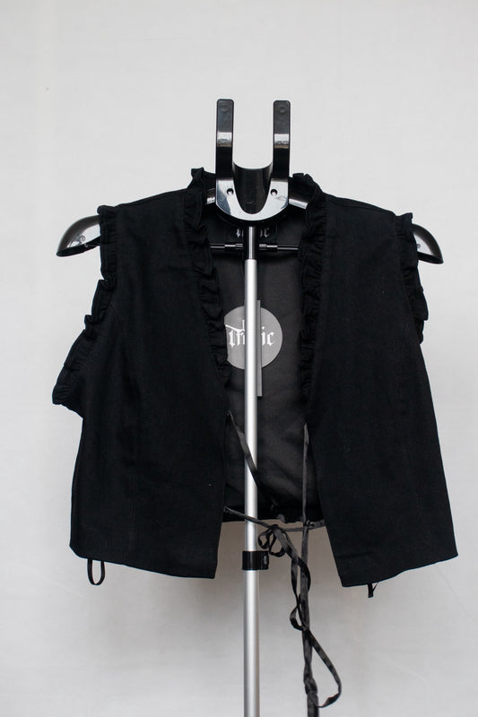 Black lace up vest with embroidered heart on back