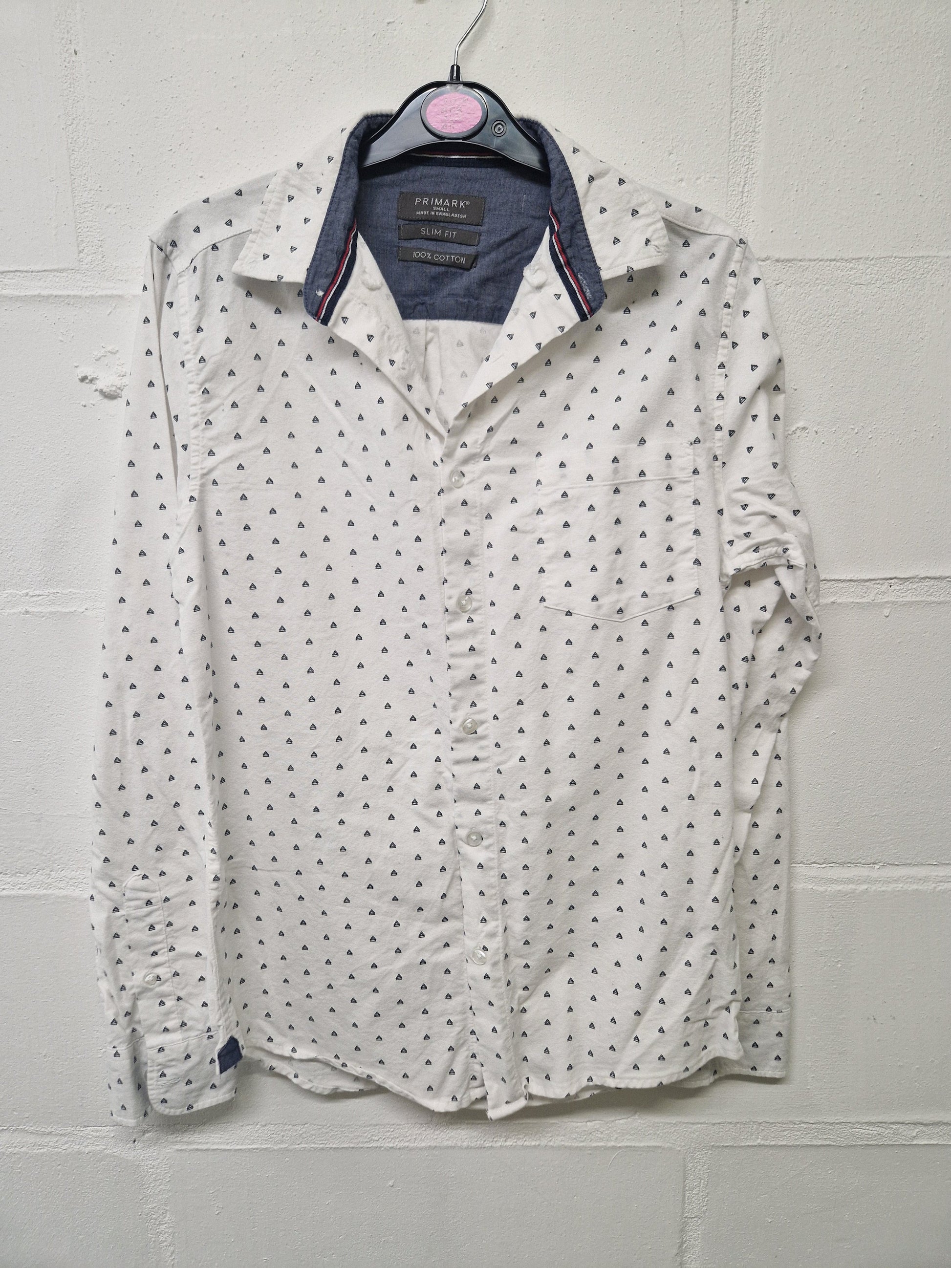 White shirt with black triangular pattern