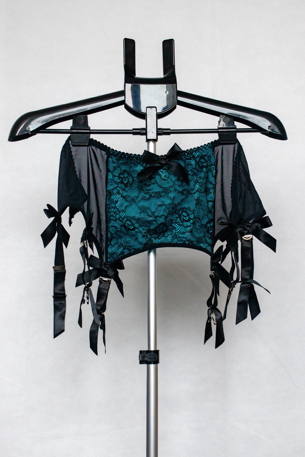 Blue and black lace garter belt