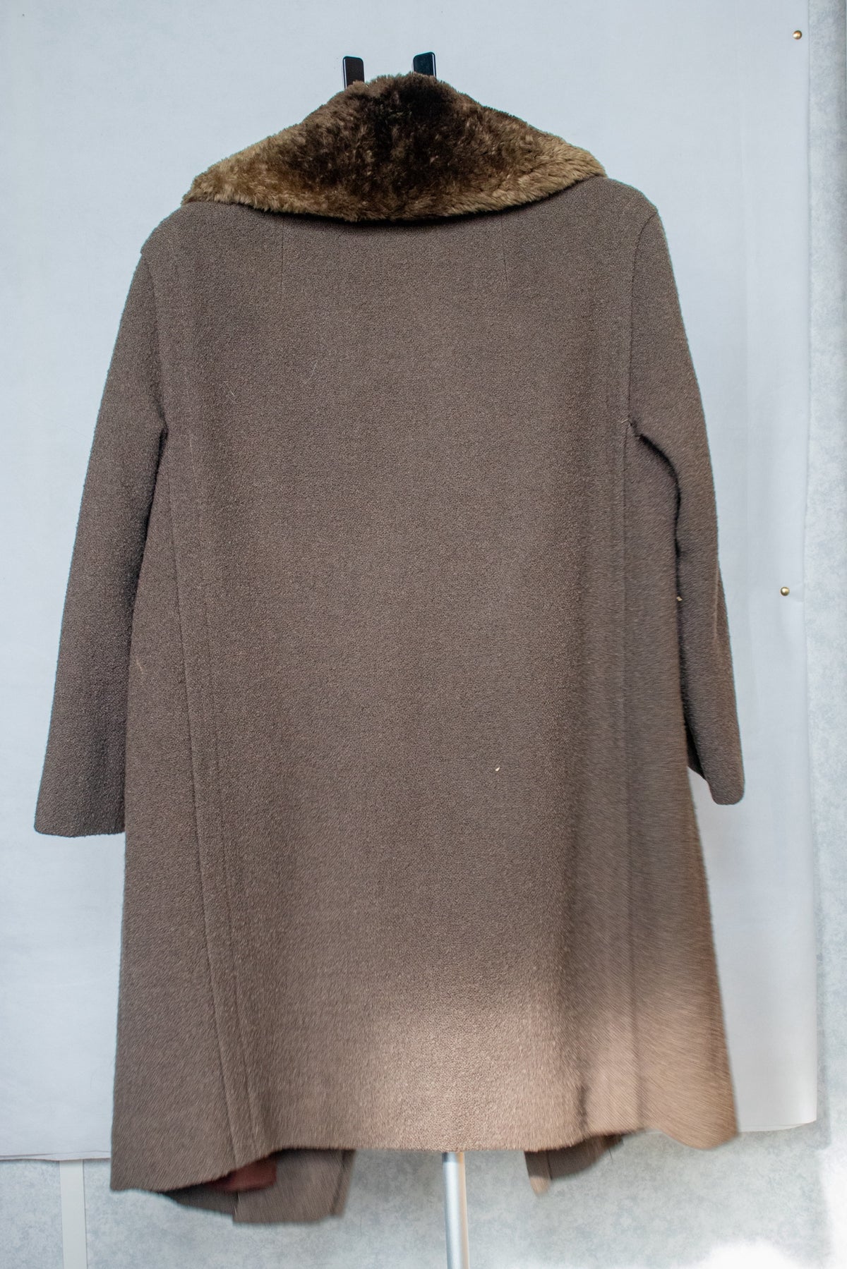 Greenish brown coat with fur