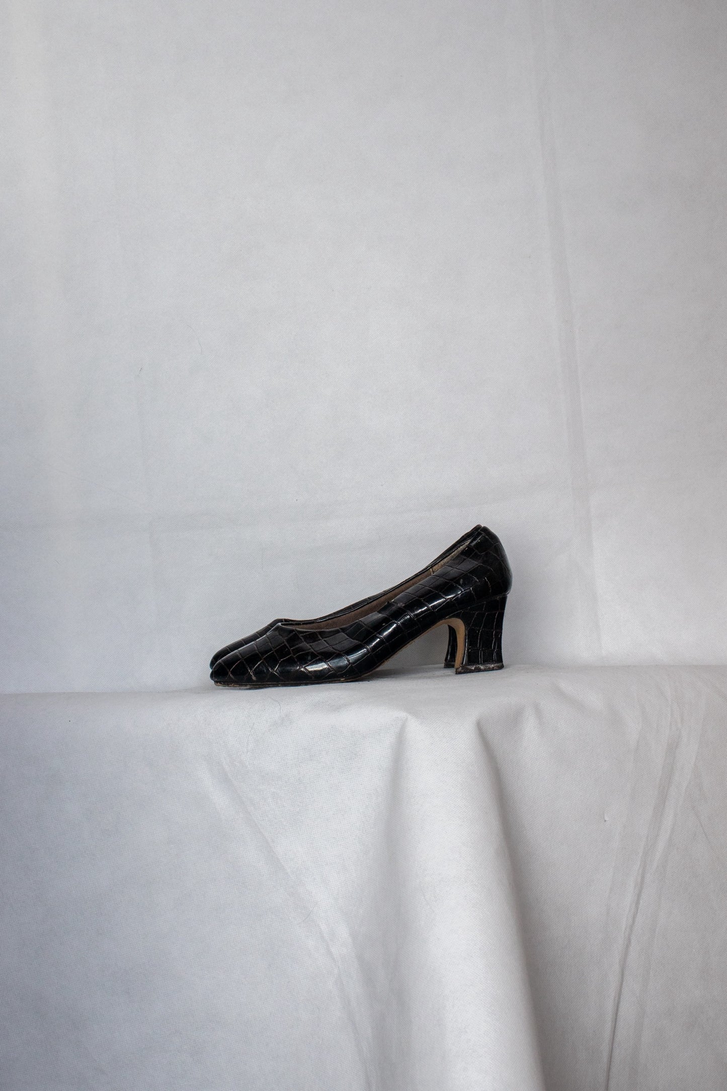 Black alligator skin kitten heels
