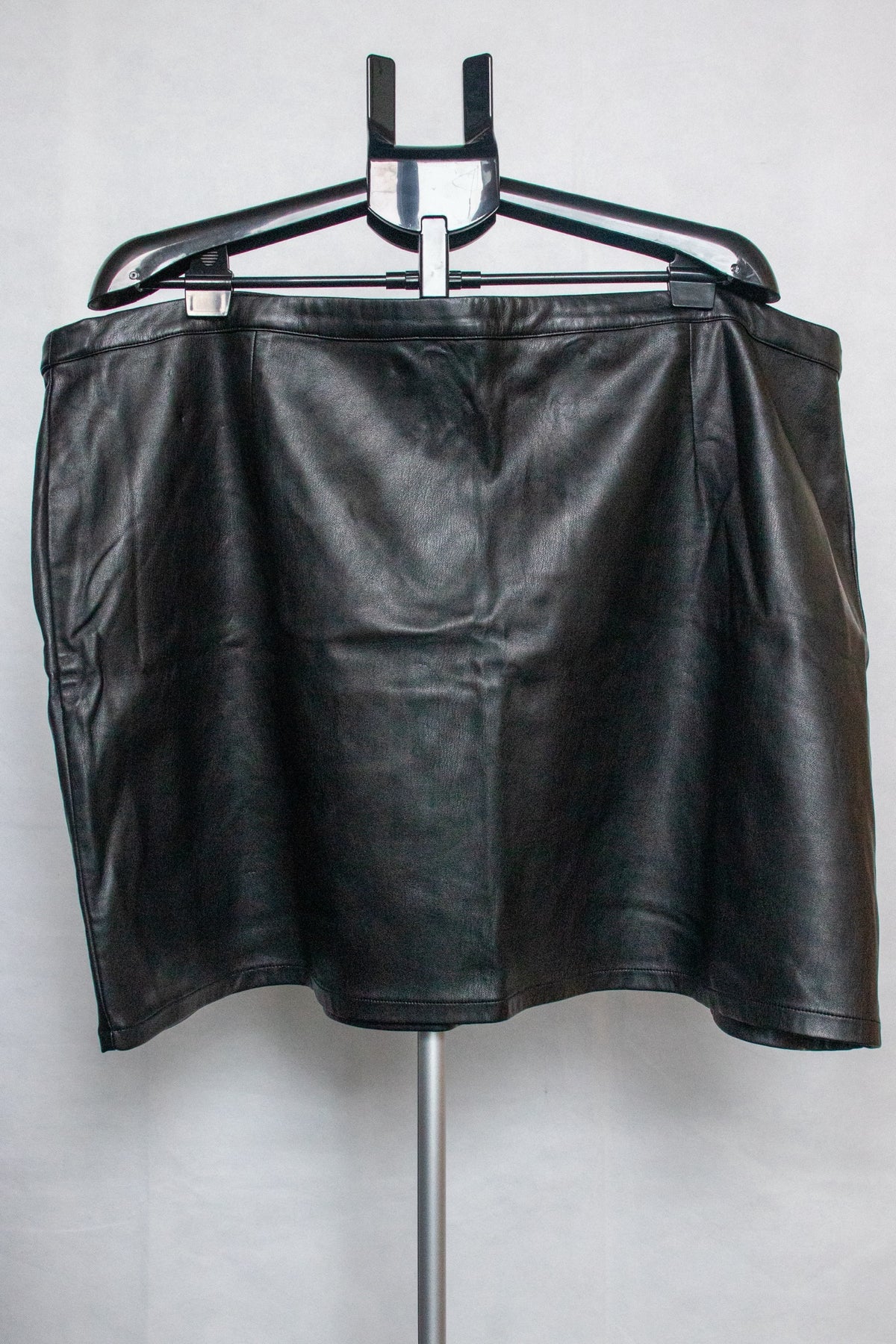 Black p leather mini skirt
