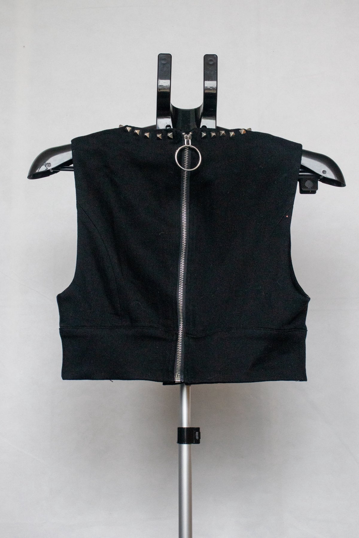 Black studded vest