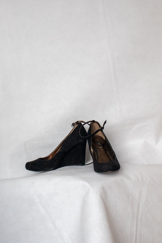 Black and gold heels