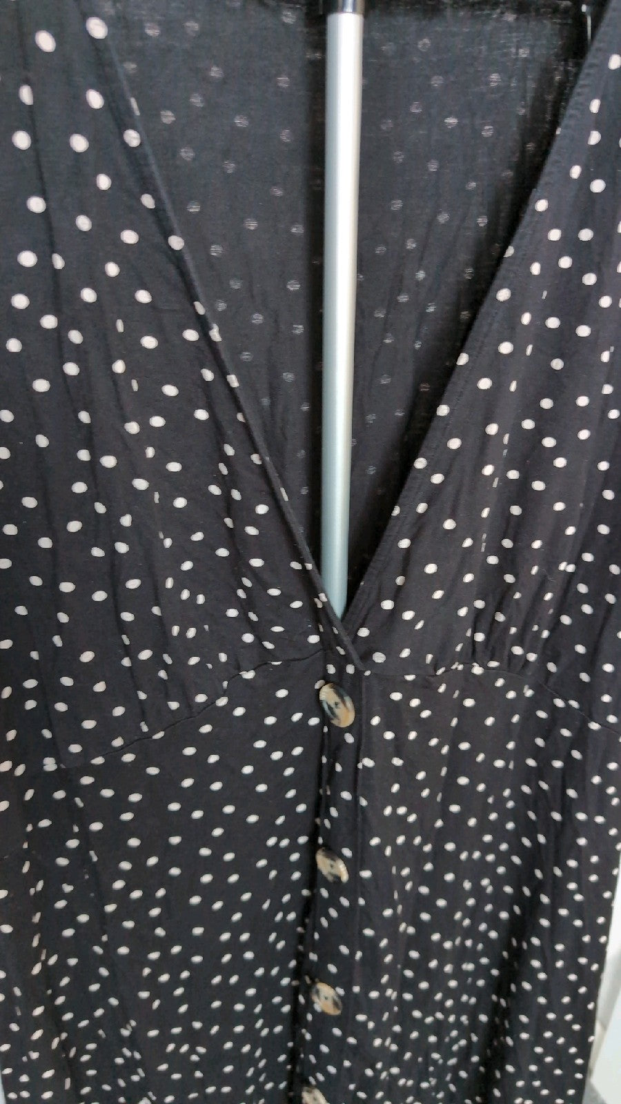 Black dress with white dots