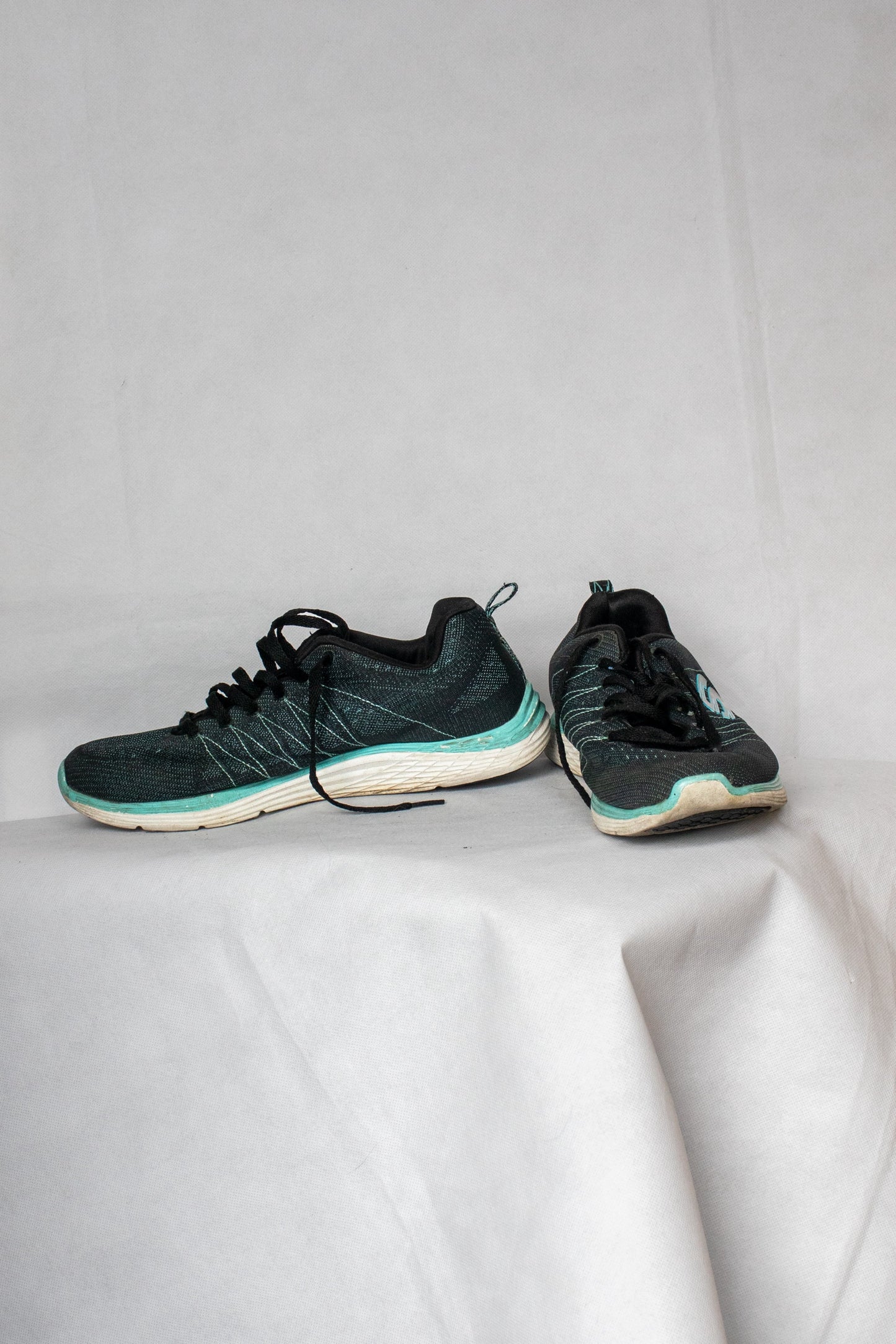 Teal running shoes