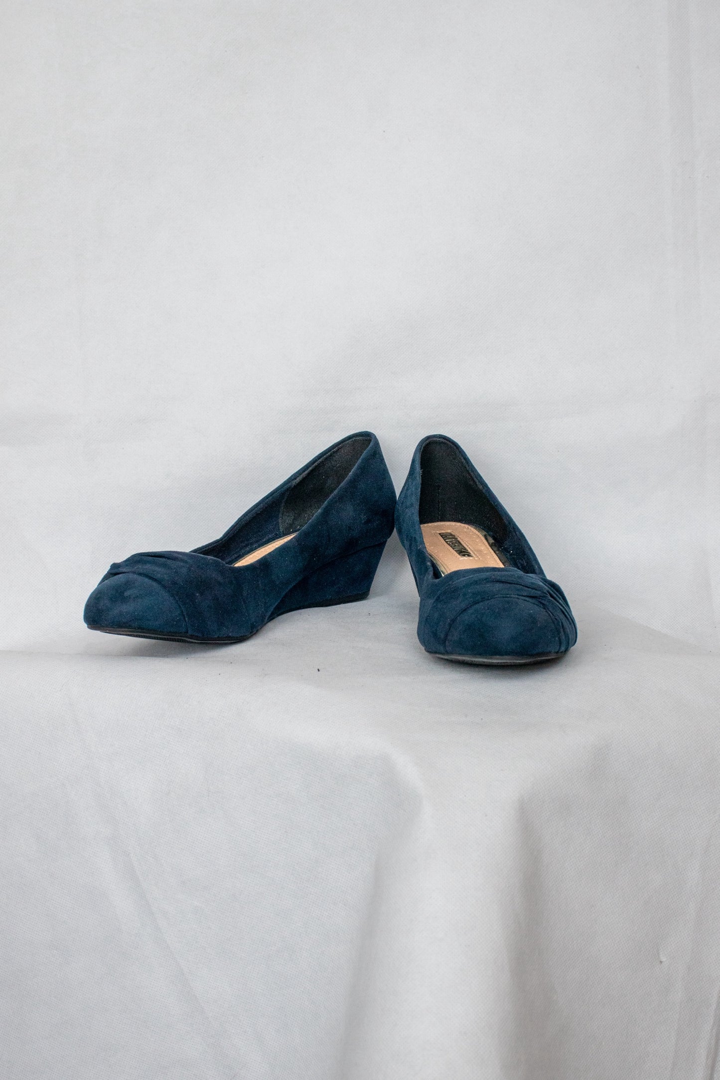 Navy wedge shoes