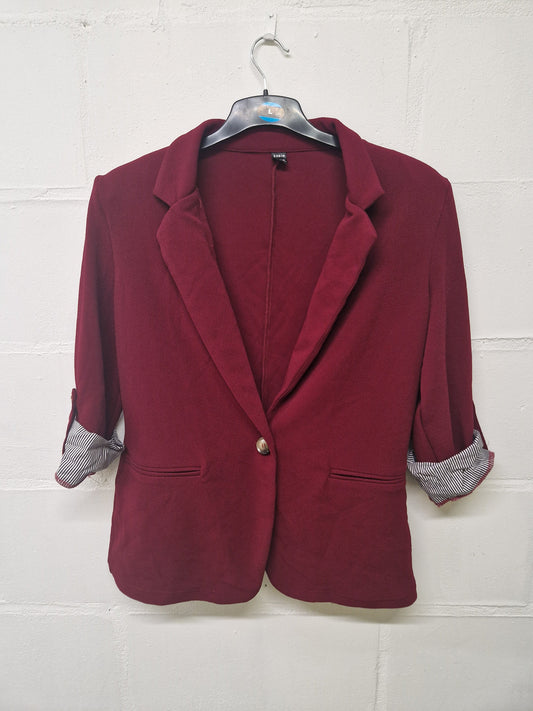 Red casual suit jacket with patterned rolled up sleeves