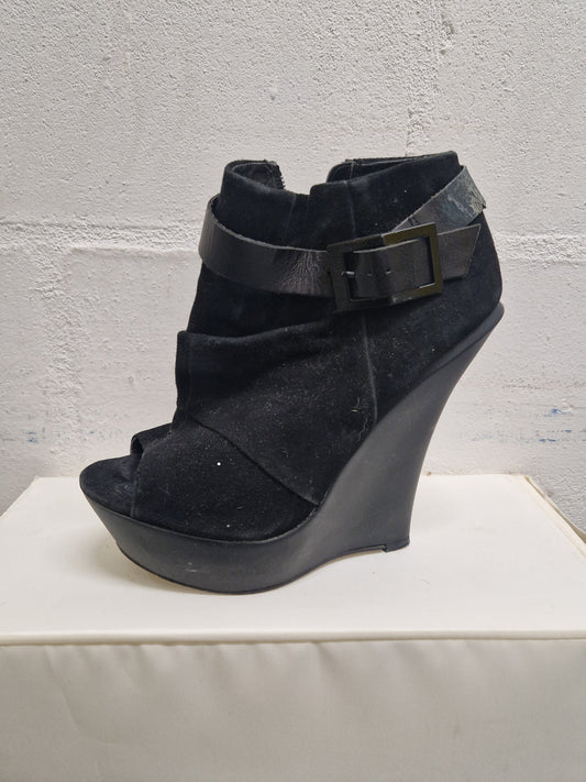 black wedge heel boots